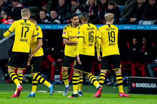 Emre Can of Borussia Dortmund celebrates with teammates