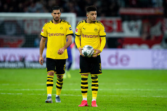 Emre Can and Jadon Sancho of Borussia Dortmund