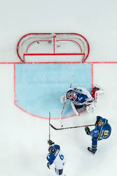 Linus Johansson of Sweden scores 1-0 behind goalkeeper