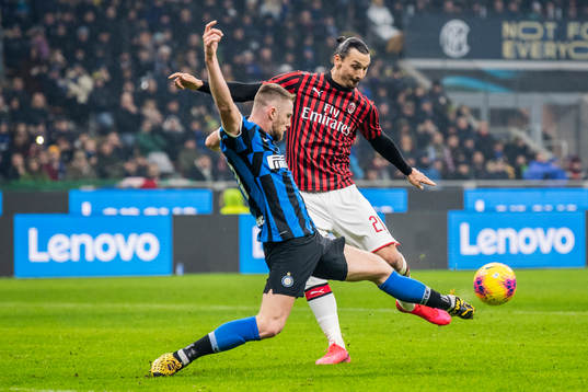 Lorenzo Pirola of Inter and Zlatan Ibrahimovic of Milan