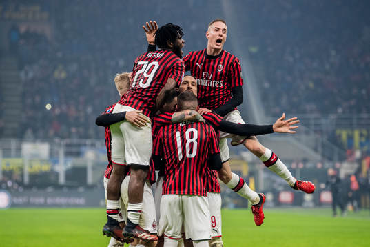 Zlatan Ibrahimovic of Milan celebrate with teammates
