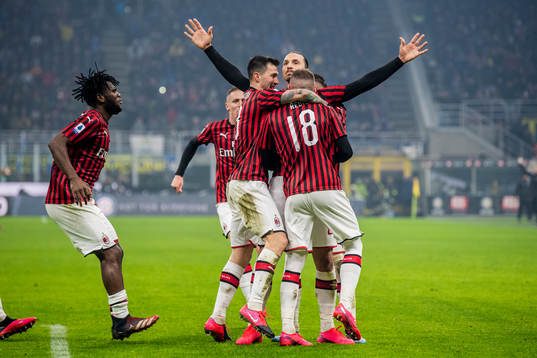 Zlatan Ibrahimovic of Milan celebrate with teammates