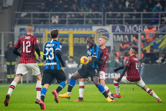 Romelu Lukaku of Inter against Simon Kjaer of Milan