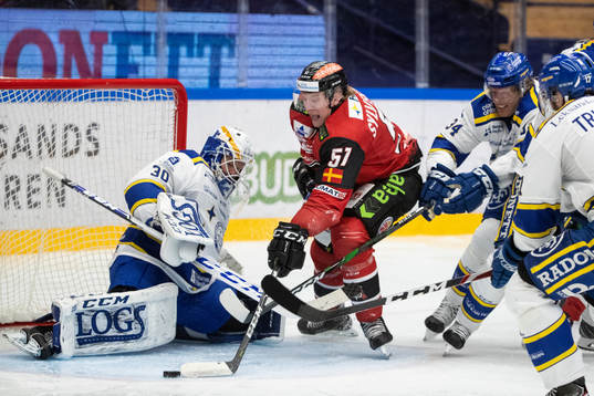 Leksands målvakt Janne Juvonen och Malmö Redhawks Emil