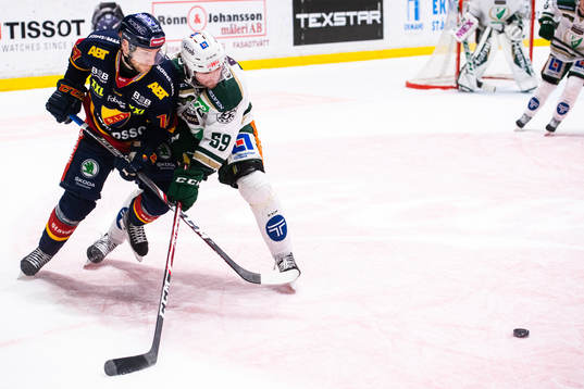 Djurgårdens Kalle Östman och Färjestads Linus Johansson