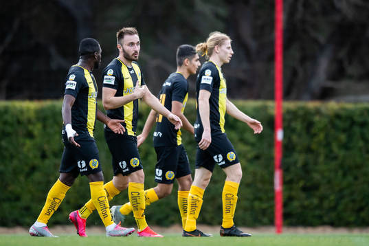 Muamer Tankovic of Hammarby celebrate with teammates