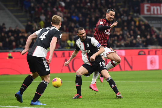 Leonardo Bonucci of Juventus and Zlatan Ibrahimovic of AC