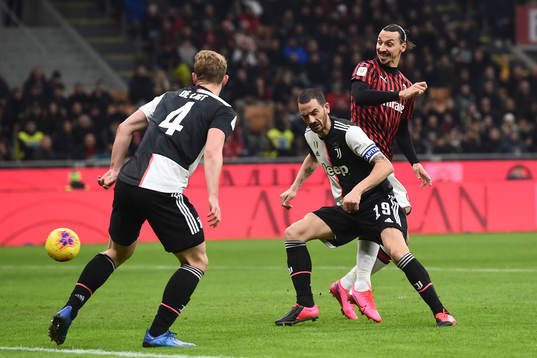 Leonardo Bonucci of Juventus and Zlatan Ibrahimovic of AC