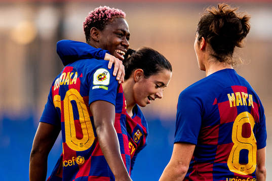 Asisat Oshoala of Barcelona celebrates with teammates