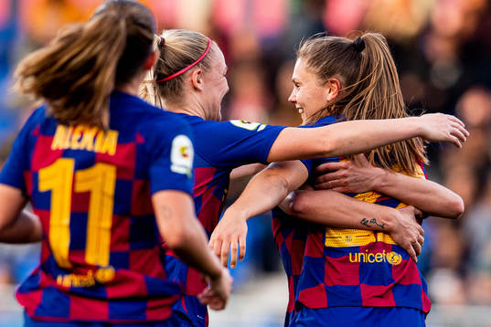 Lieke Martens of Barcelona celebrates with teammates