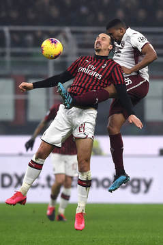 Zlatan Ibrahimovic of Milan against Gleison Bremer of Torino