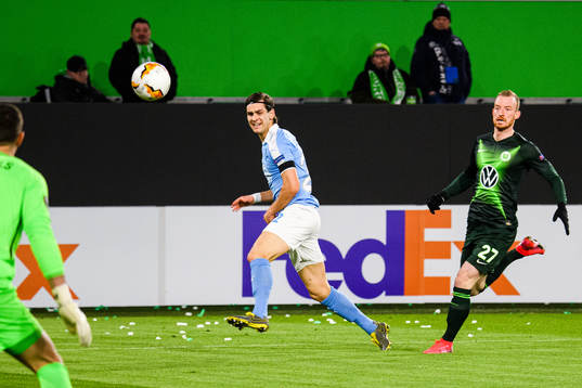 Adi Nalic of Malmö FF and Maximilian Arnold of Wolfsburg