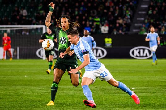 Kevin Mbabu of Wolfsburg and Marcus Antonsson of Malmö FF