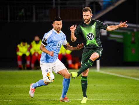 Behrang Safari of Malmö FF and Admir Mehmedi of Wolfsburg