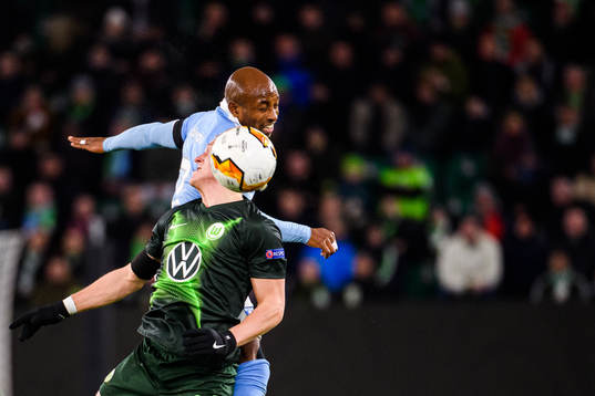 Xaver Schlager of Wolfsburg and Fouad Bachirou of Malmö FF
