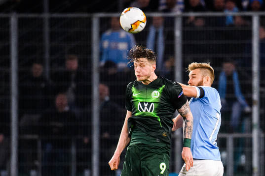 Wout Weghorst of Wolfsburg and Rasmus Bengtsson of Malmö FF