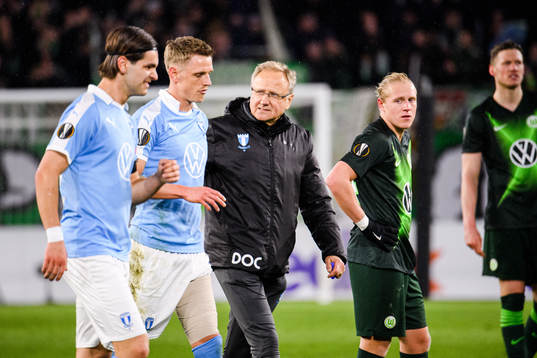 Sören Rieks of Malmö FF leaves the pitch in pain
