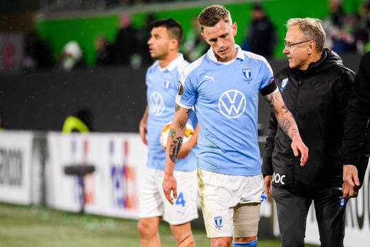Sören Rieks of Malmö FF leaves the pitch in pain