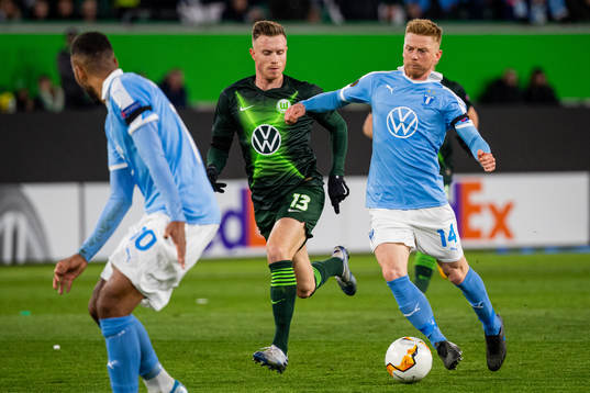 Anders Christiansen of Malmö FF and Yannick Gerhardt of