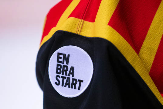 En logotyp för En bra start på en matchtröja