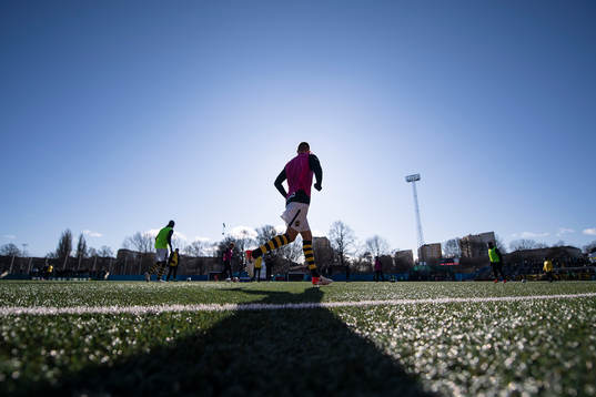 s spelare värmer upp
