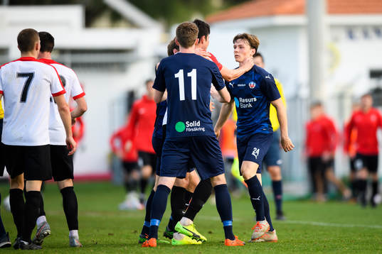 Tekstilshchiks Aleksandr Chibirov tar strypgrepp på