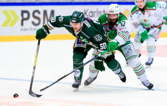 Färjestads Sebastian Erixon och Rögles Taylor Matson