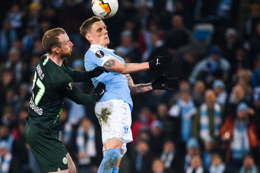 Maximilian Arnold of Wolfsburg and Sören Rieks of Malmö FF