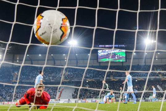 Goalkeeper Johan Dahlin of Malmö FF looks dejected as 0-1