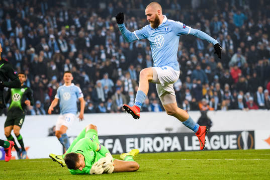 Jo Inge Berget of Malmö FF and goalkeeper Koen Casteels of