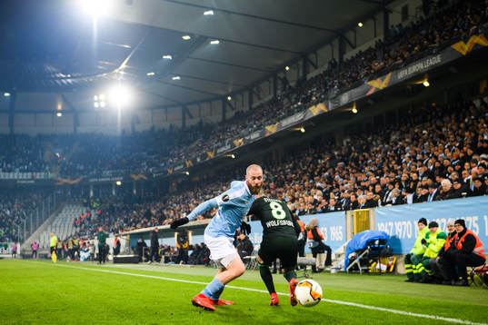 Jo Inge Berget of Malmö FF and Renato Steffen of Wolfsburg