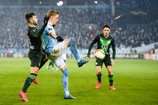 Sören Rieks of Malmö FF and Renato Steffen of Wolfsburg