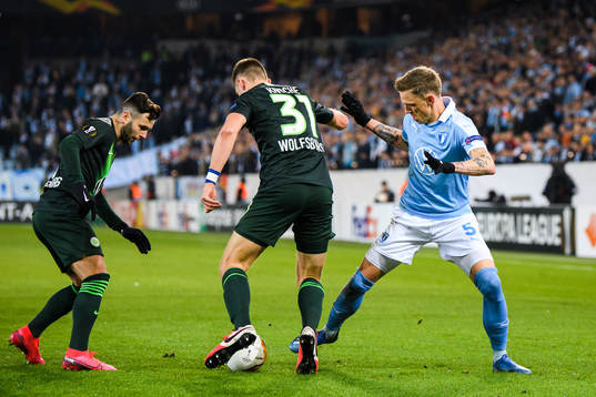 Sören Rieks of Malmö FF and Robin Knoche of Wolfsburg