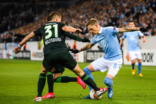 Sören Rieks of Malmö FF and Robin Knoche of Wolfsburg