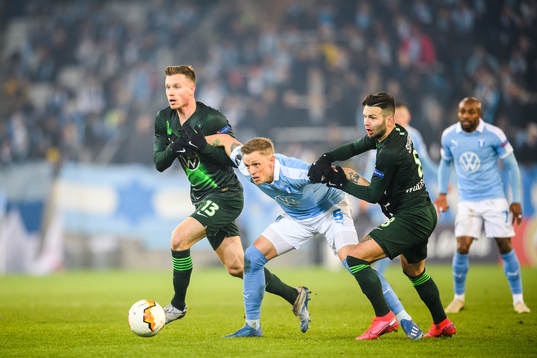 Sören Rieks of Malmö FF against Yannick Gerhardt and