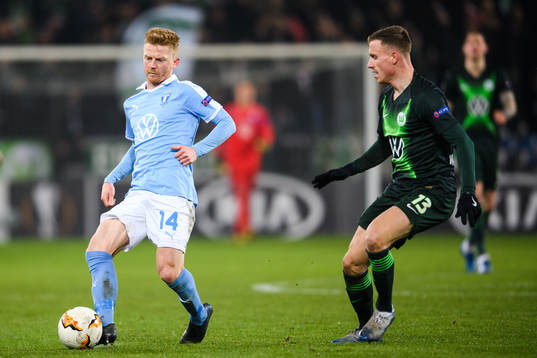 Anders Christiansen of Malmö FF and Yannick Gerhardt of