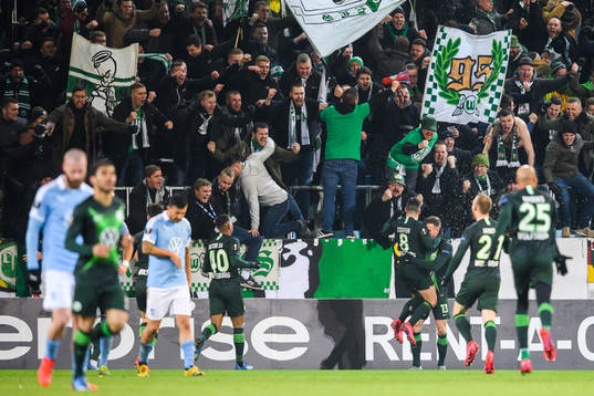 Yannick Gerhardt of Wolfsburg celebrates the 0-2