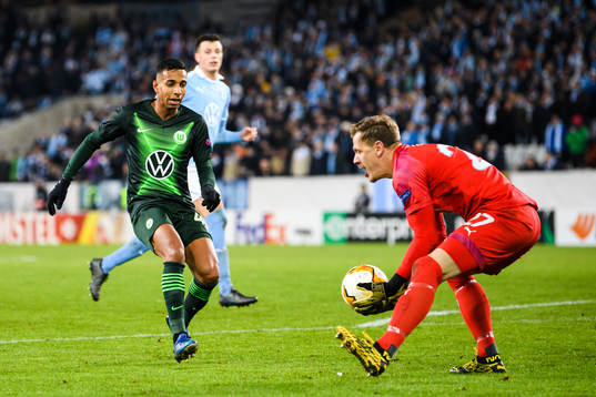 João Victor of Wolfsburg and goalkeeper Johan Dahlin of