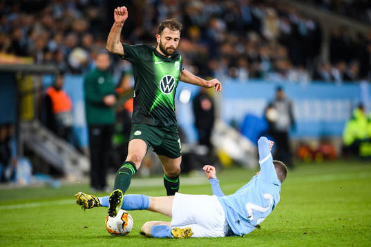 Admir Mehmedi of Wolfsburg and Lasse Nielsen of Malmö FF