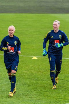 Goalkeeper Hedvig Lindahl and Caroline Seger