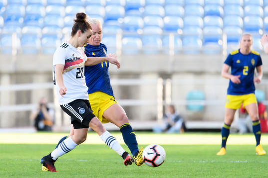 Lina Magull of Germany and Stina Blackstenius of Sweden