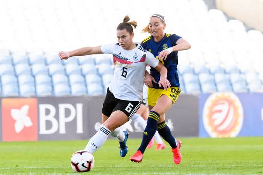 Lena Sophie Oberdorf of Germany and Kosovare Asllani of