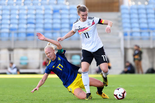 Caroline Seger of Sweden against Alexandra Popp of Germany