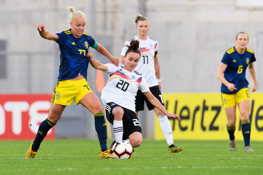 Caroline Seger of Sweden and Lina Magull of Germany