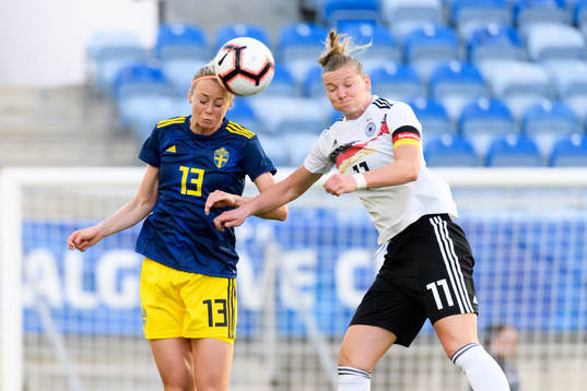 Amanda Ilestedt of Sweden and Alexandra Popp of Germany