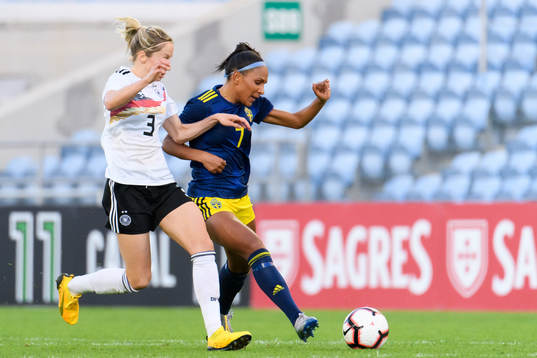 Kathrin Hendrich of Germany and Madelen Janogy of Sweden