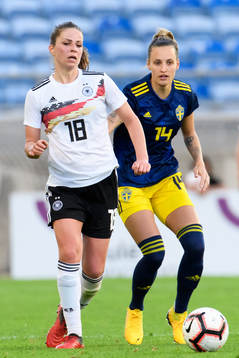 Melanie Leupolz of Germany and Nathalie Björn of Sweden