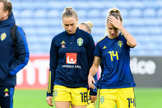 Fridolina Rolfö and Nathalie Björn of Sweden look dejected