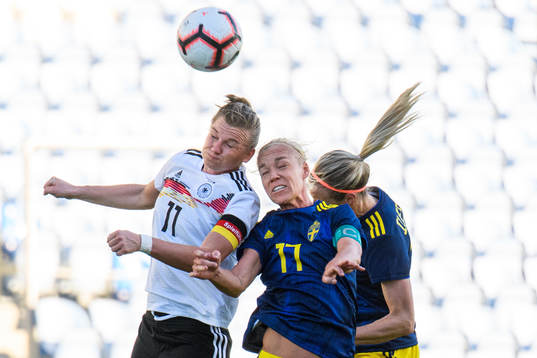 Alexandra Popp of Germany and Caroline Seger of Sweden