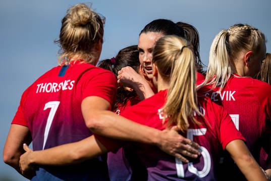 Elise Thorsnes of Norway celebrates with Ingrid Syrstad